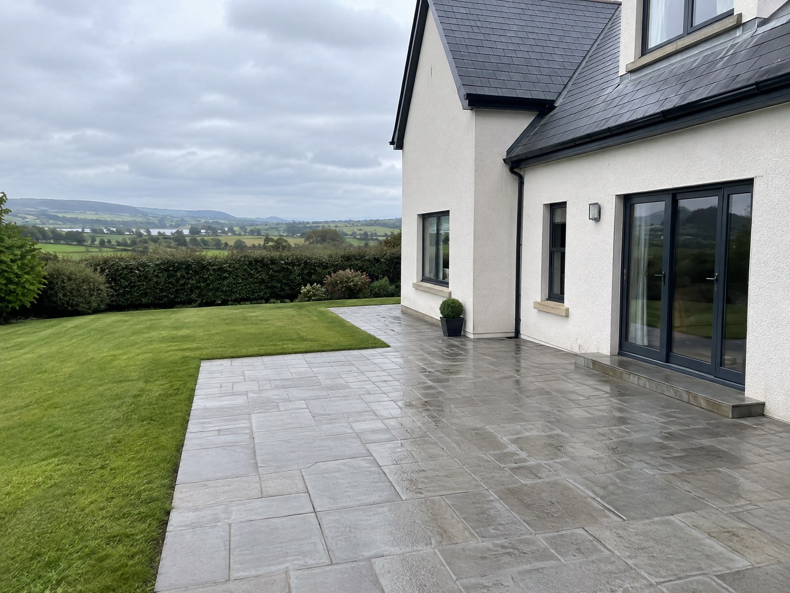 Freshly powerwashed patio at a Northern Irish detached house
