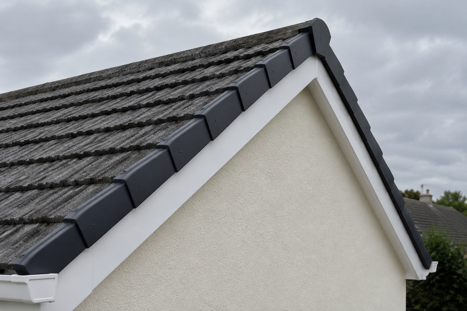 New black dry verge caps fitted on the gable of an Irish house
